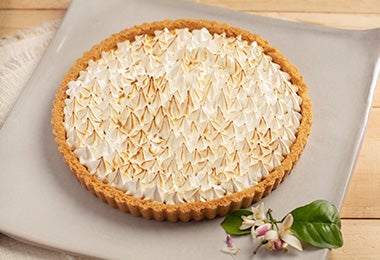 Receta de pie de limón decorada con picos de tipo de merengue  